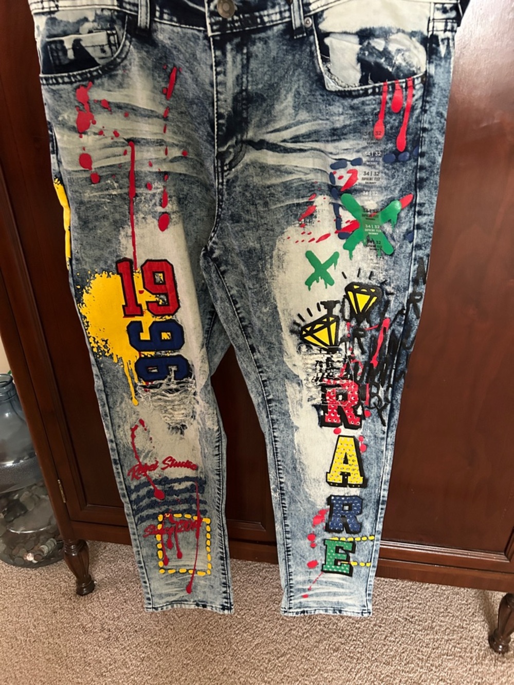 Rue21 Acid-Wash Skinny Jeans with Multicolor Paint & Patch Details